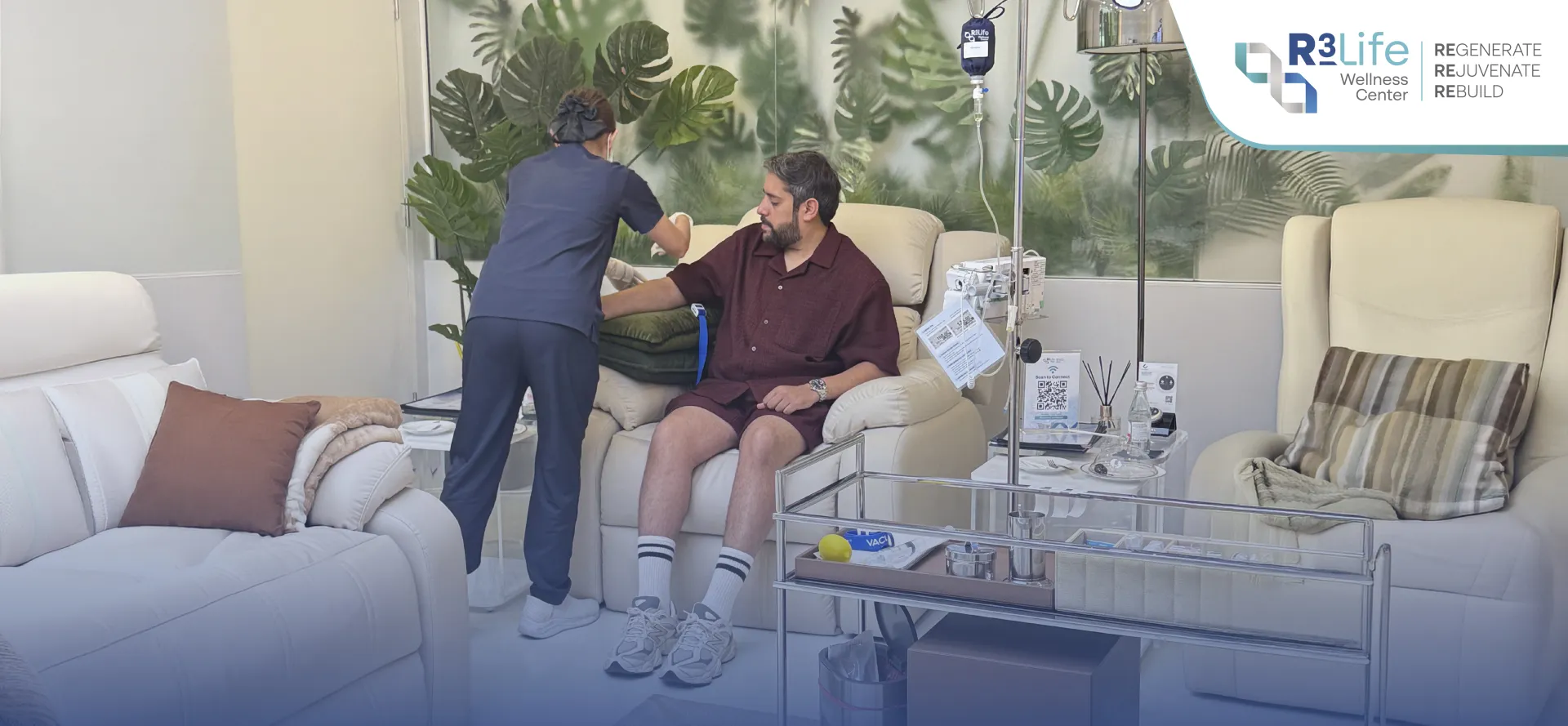 Nurse preparing a client for treatment in a private room at R3 Life