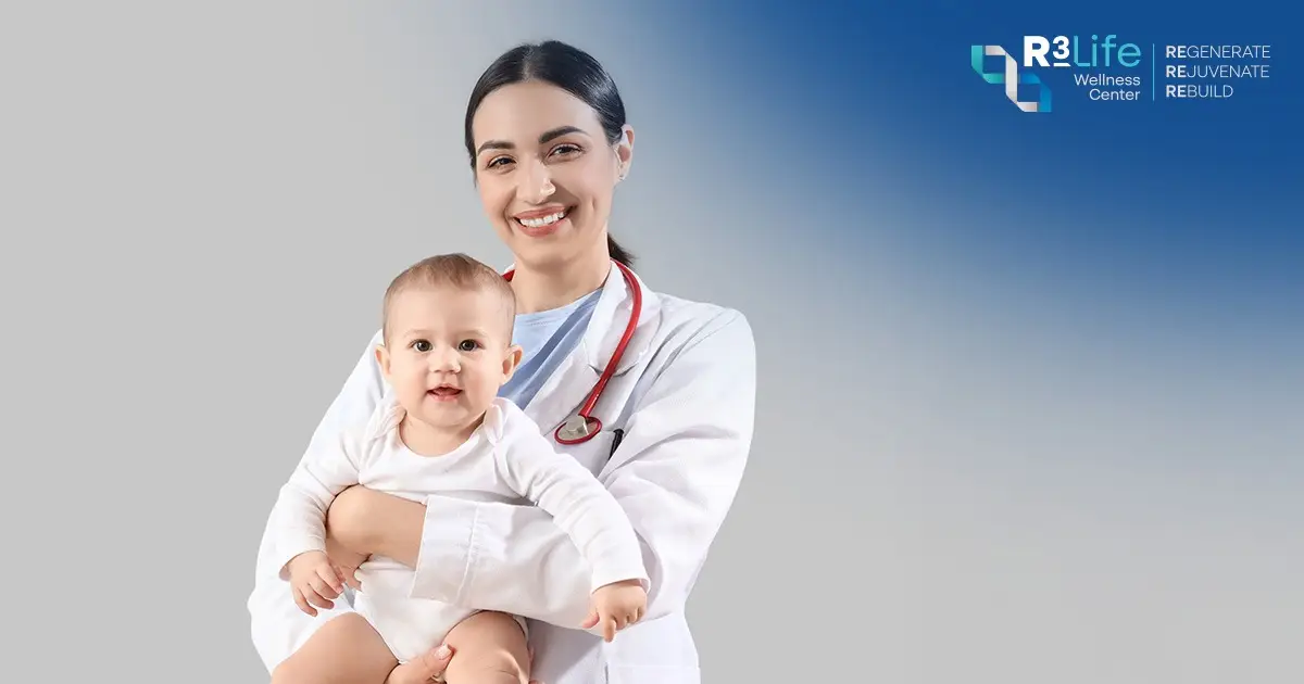 Female doctor holding a baby as a symbol of preventive maternal and infant healthcare